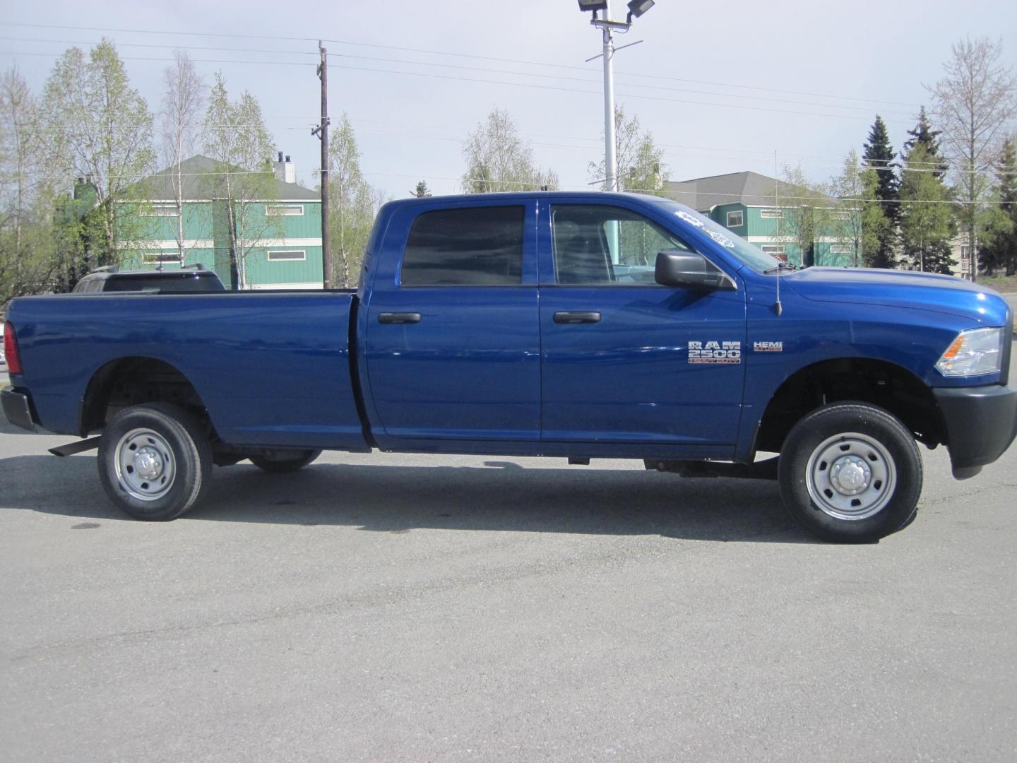 2016 blue /gray RAM 2500 Tradesman Crew Cab 4WD (3C6TR5HTXGG) with an 5.7L V8 OHV 16V engine, automatic transmission, located at 9530 Old Seward Highway, Anchorage, AK, 99515, (907) 349-3343, 61.134140, -149.865570 - Low miles in this Ram 2500 come take a test drive - Photo#2